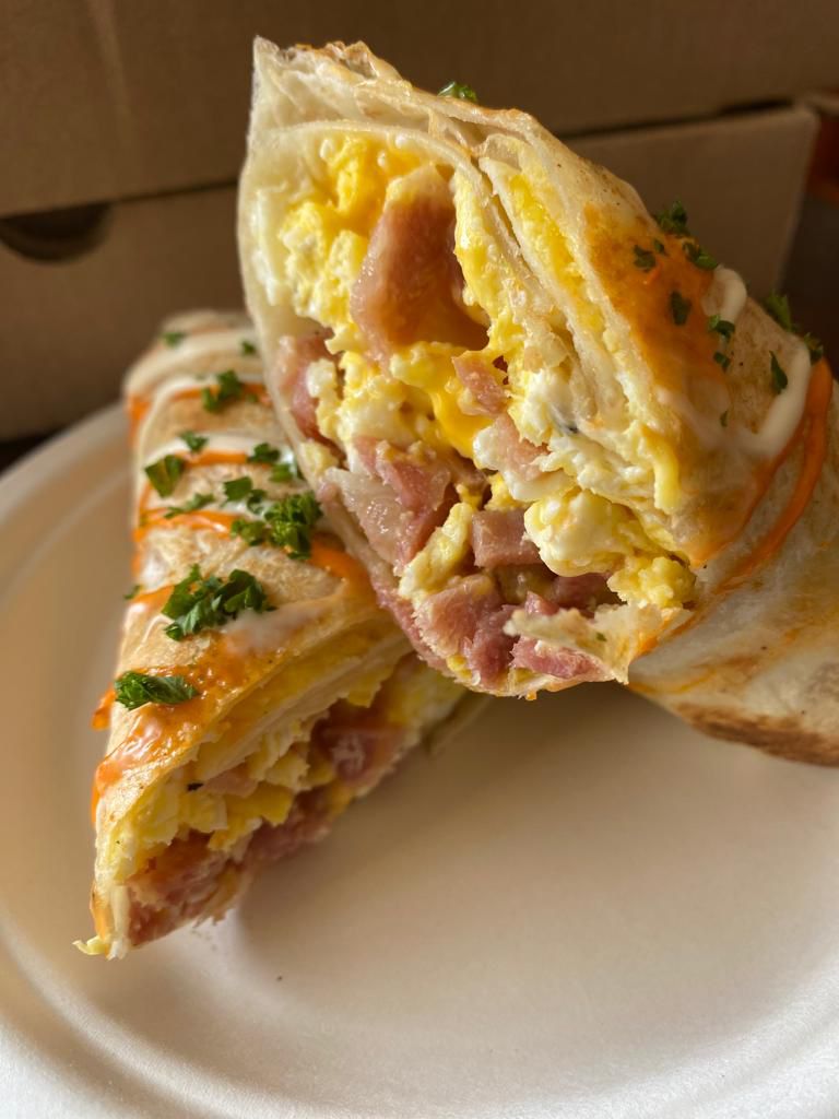 Breakfast burrito cut in half
